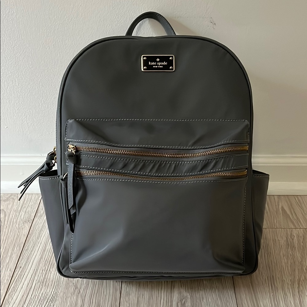 Kate Spade Gray Backpack with Signature Logo and Durable Design